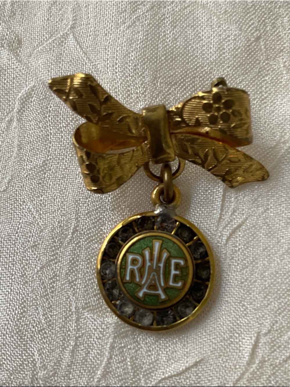 Gold Bow Brooch with Green Enamel & Rhinestone Pendant